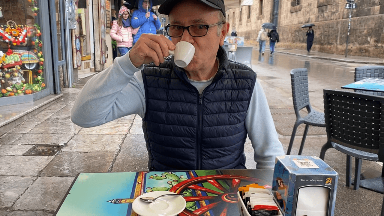 Croce Amato experiences the real cost of living in Sicily while getting an espresso at local café in Palermo