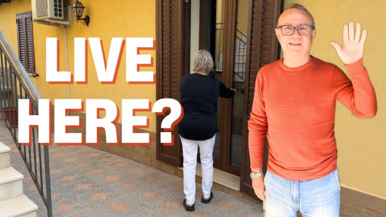 Carol and Croce at the front door of their Sicilian cottage in Carini