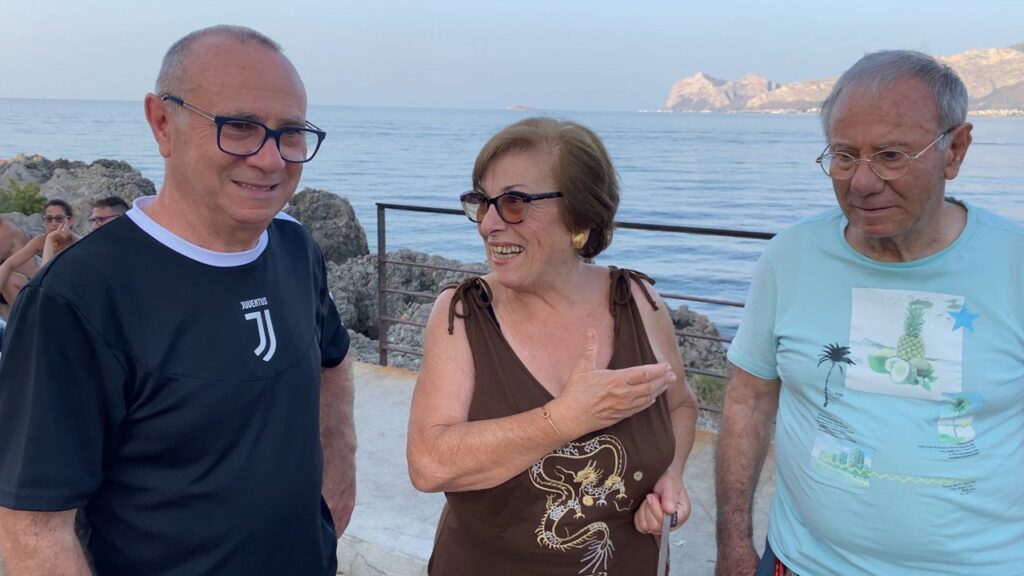 Croce with Antonina and Saridu reconnecting through family stories while living in Carini Sicily