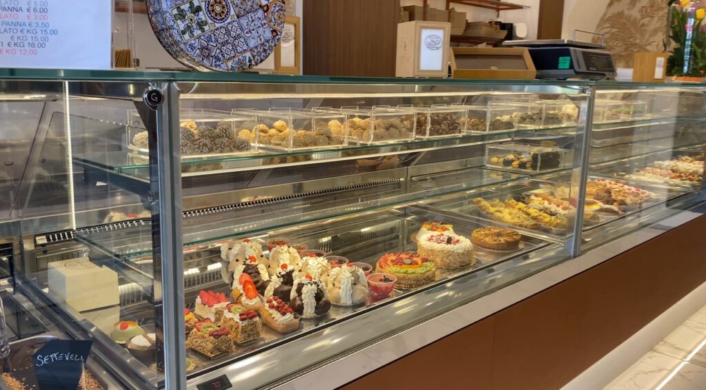 Sicilian pastries at Longo Bakery during daily life in Sicily