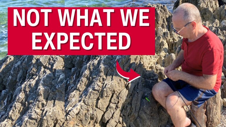 Croce preparing his fishing line on the rocks in Carini, Sicily, with the Tyrrhenian Sea behind him